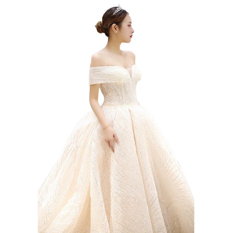 Vestido de novia estilo TikTok 2026, nuevo modelo, de ensueño para la novia, con hombros descubiertos, efecto adelgazante, cola larga, estilo corte, artesanía exquisita, súper mágico.