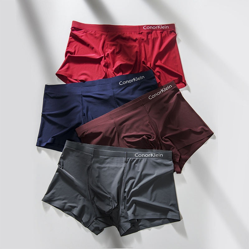 Genuine goods ConorKlein men's ice silk underwear solid color seamless one-piece breathable mid-waist boxer shorts foreign trade fashion
