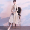 Long, champagne color, mid-length