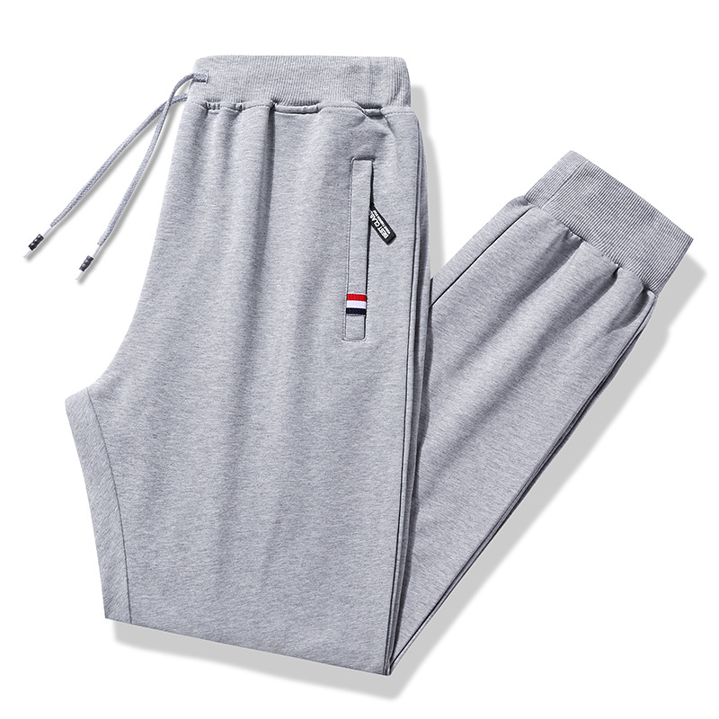 Pantalones deportivos de invierno de algodón para hombres más tamaño pantalones casuales gruesos forrados de lana pantalones casuales sueltos de bolsillo con cremallera atados al tobillo pantalones de hombre