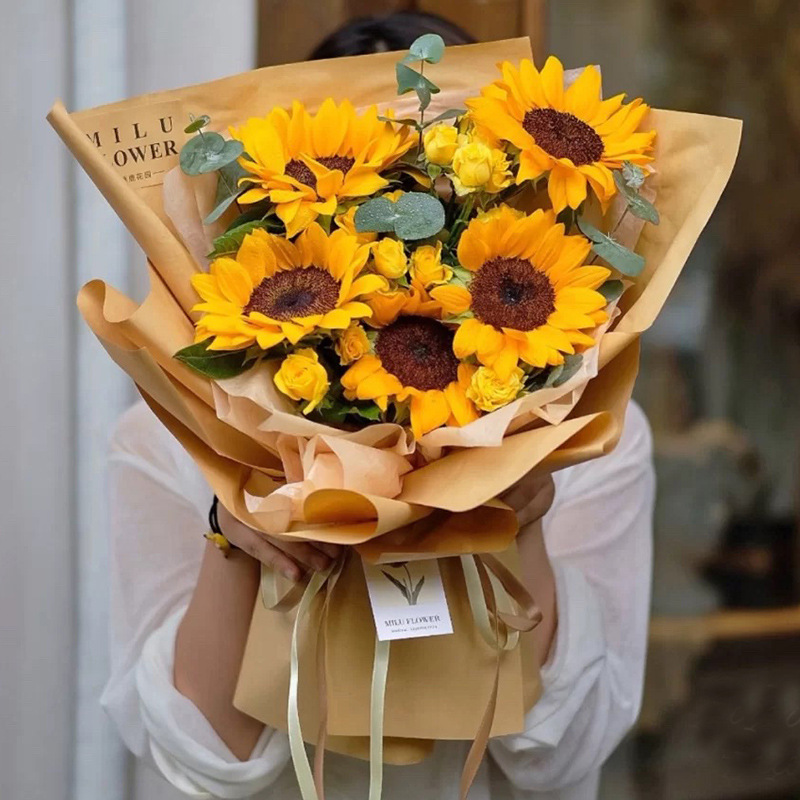 Fábrica al por mayor de papel Kraft de color primario flor papel de regalo floristería ramo floral embalaje de papel Kraft de color sólido