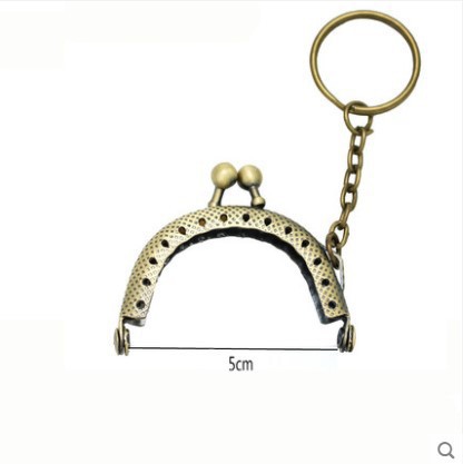 Oro boca pequeña con llavero