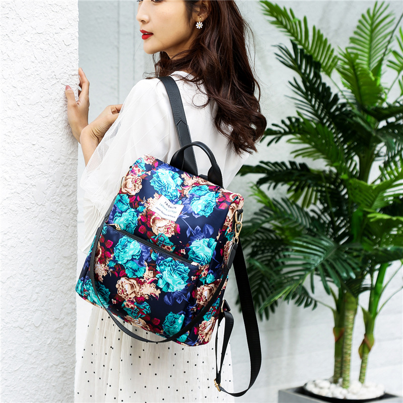 Nuevo estudiante mochila Junior High School estudiante de gran capacidad antirrobo mochila estilo coreano impreso chica mochila de viaje al por mayor