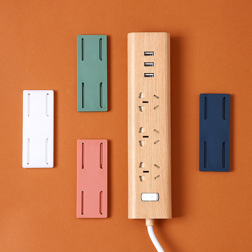 Power strip holder, traceless sticker, self-adhesive wall hanging, punch-free storage, order-free patch panel, router buckle wholesale