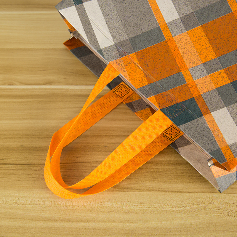 En stock bolsa de película no tejida zapatos de compras bolso de ropa no tejida bolsa de publicidad impresa logotipo