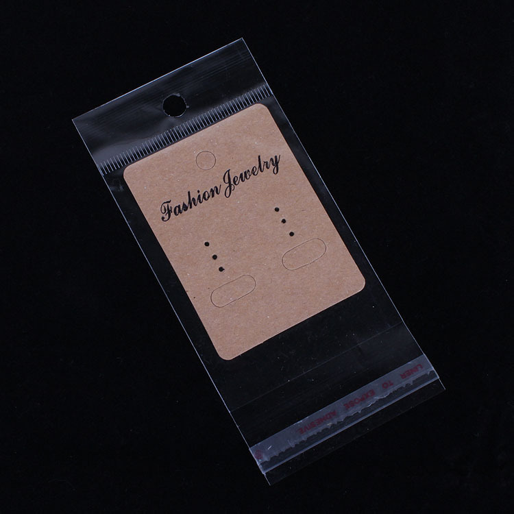 厂家直销  包装饰品透明opp自封袋子带挂带胶 6*12.5cm 内空6*7cm