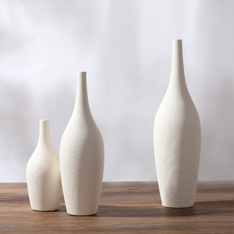 Moderno simple pigmento blanco quema de cerámica florero salón muebles para el hogar adornos modernos artesanías decorativas al por mayor