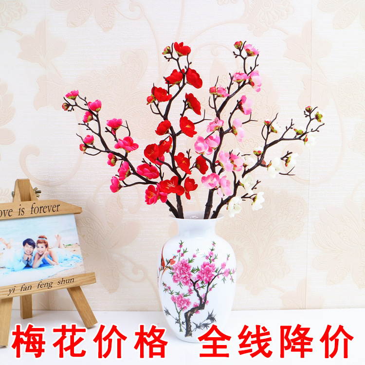 Venta al por mayor chino pastoral flor artificial del ciruelo al por mayor flor falsa pequeña flor del ciruelo rama salón flor decorativa