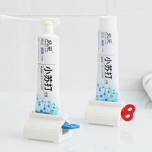 日式牙膏挤压器创意挤牙膏器懒人洗面奶手动护手霜自动挤牙膏神器