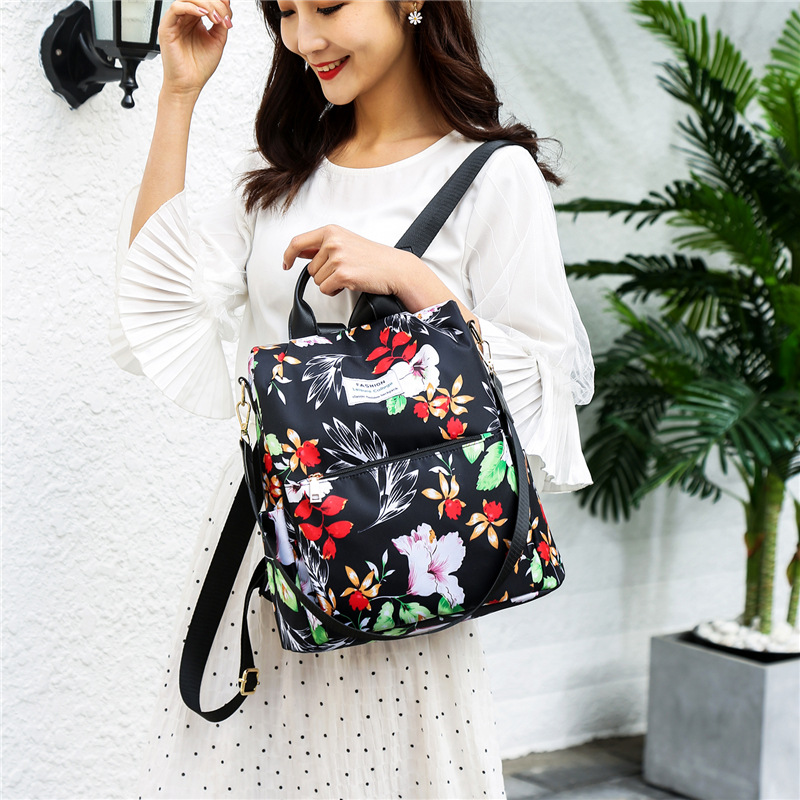 Nuevo estudiante mochila Junior High School estudiante de gran capacidad antirrobo mochila estilo coreano impreso chica mochila de viaje al por mayor