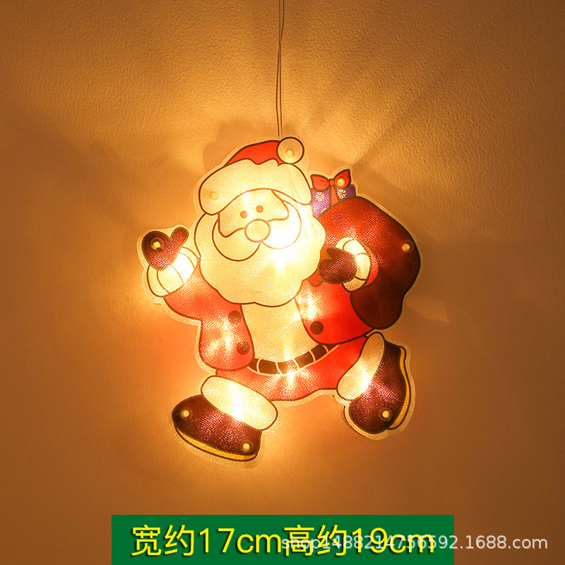 Papá Noel da regalos - Pequeño