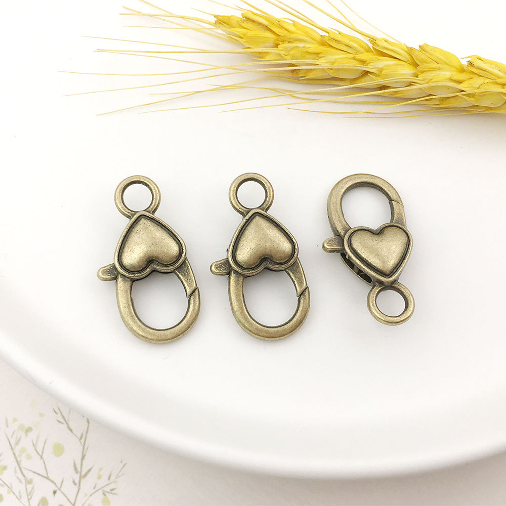 Melocotón hebilla de langosta en forma de corazón accesorios de llavero bricolaje hardware de equipaje hebilla de langosta en forma de corazón de aleación de zinc