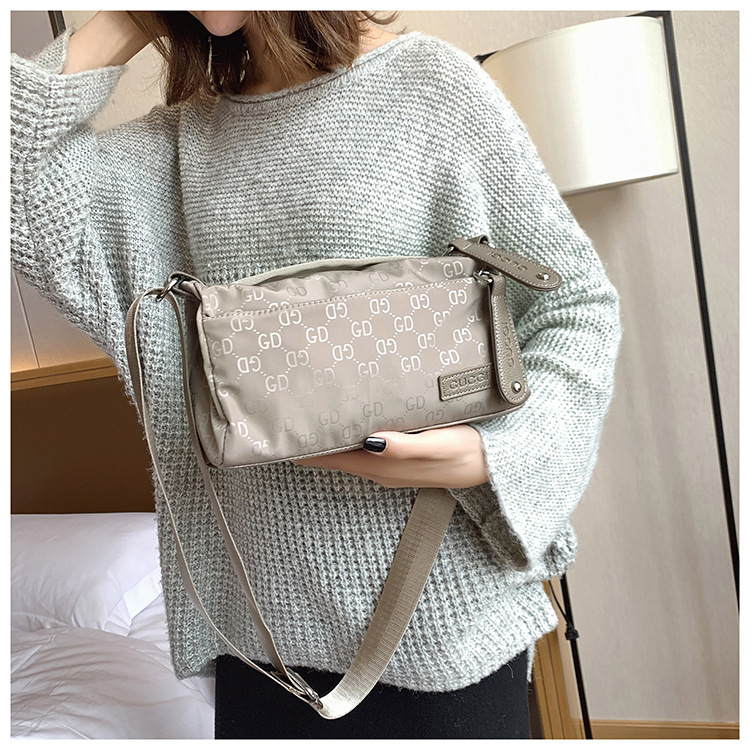 Cross-border wholesale 2022 new women's bag fashion waterproof shoulder diagonal nylon cloth waterproof cylinder bag