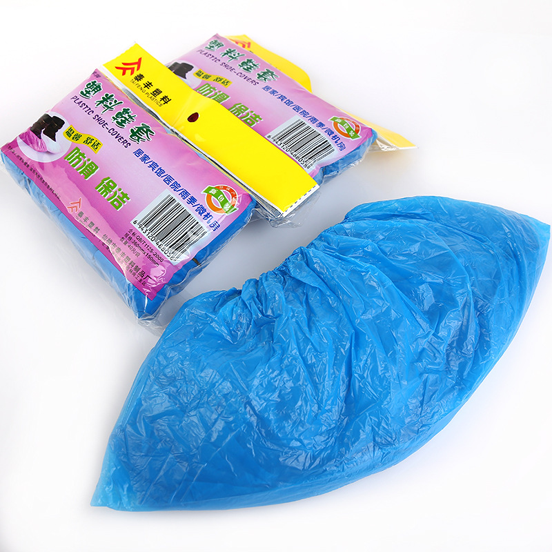 Nueva cubierta de zapato PE impermeable a prueba de lluvia cubierta de zapato engrosada PE plástico azul cubierta de zapato a prueba de polvo antideslizante