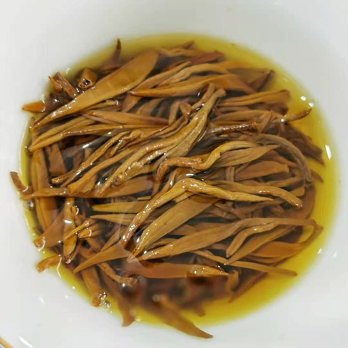 Wholesale Yunnan 2024 Large Leaf Dian Hong Black Tea Single Bud Artisanal Red Tea Honey Aroma Golden Silk Dian Hong Black Tea from a 70-year-old factory