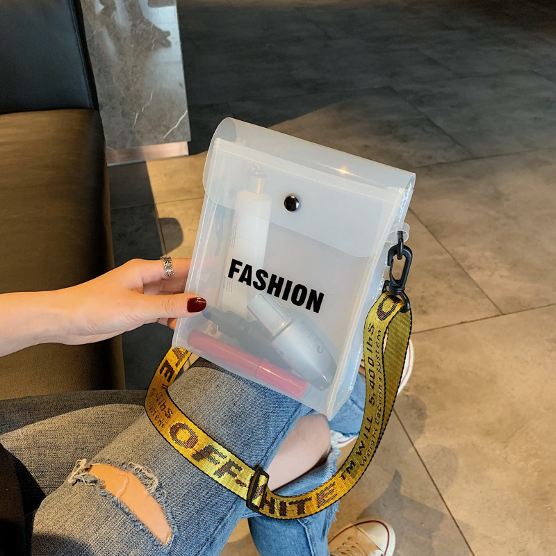 Bolso transparente para niños, nueva versión coreana en verano, letras yangqi, hombres y mujeres, gel de plástico para niños, moda de teléfonos móviles