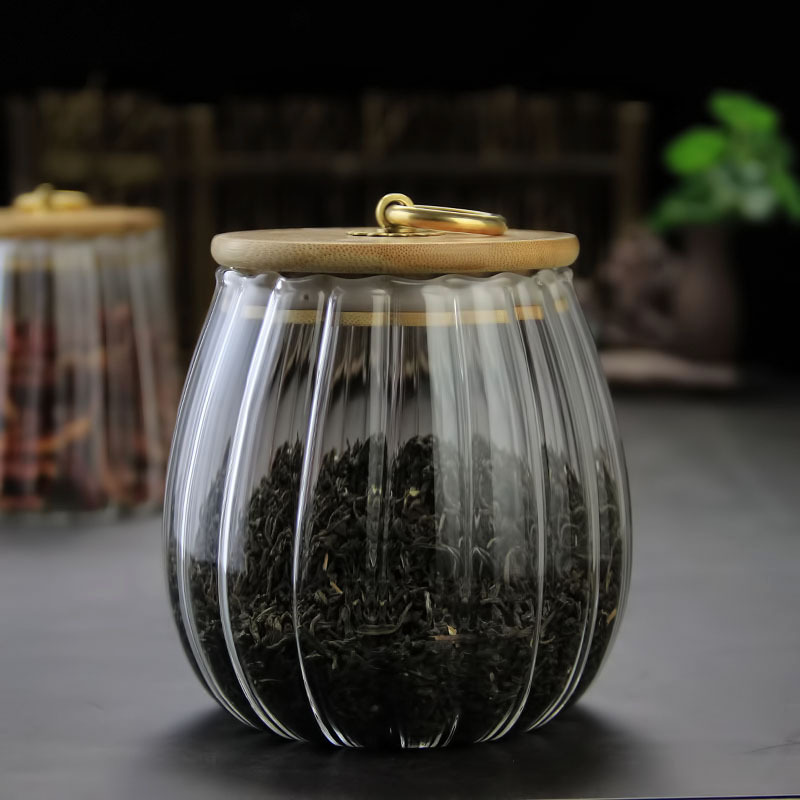 Frasco de almacenamiento de vidrio de crisantemo al por mayor transparente de almacenamiento sellado frasco de té hogar a prueba de humedad frasco de almacenamiento de vidrio de grano vertical