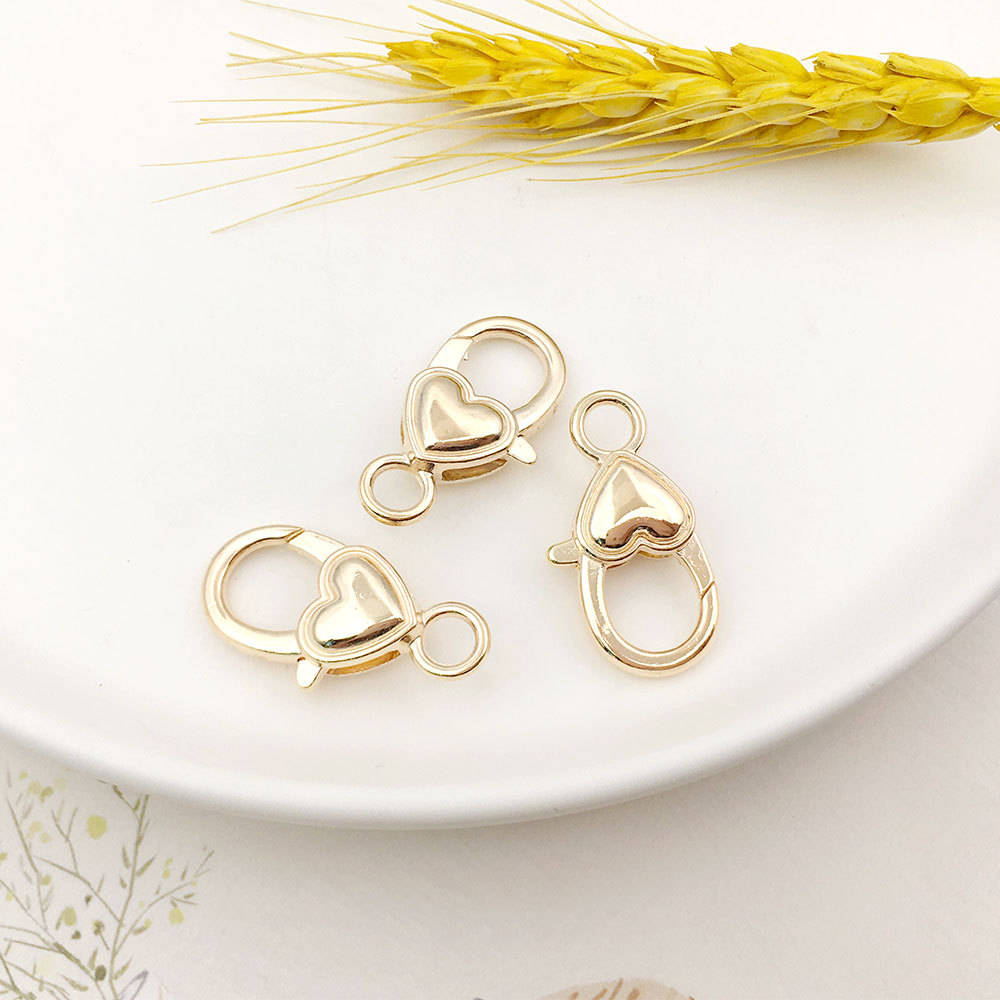 Melocotón hebilla de langosta en forma de corazón accesorios de llavero bricolaje hardware de equipaje hebilla de langosta en forma de corazón de aleación de zinc