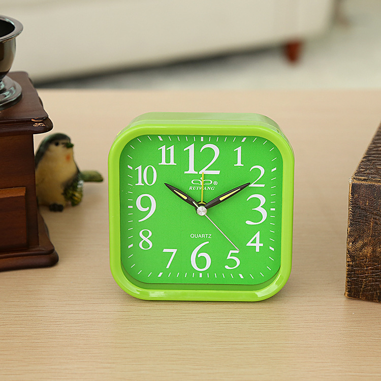 Factory Direct simple three-dimensional fashion home decoration student mute creative small alarm clock can provide LOGO color