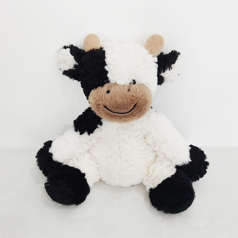 Nuevo juguete creativo lindo sentado vaca muñeca vaca peluche juguete al por mayor año de buey mascota regalo