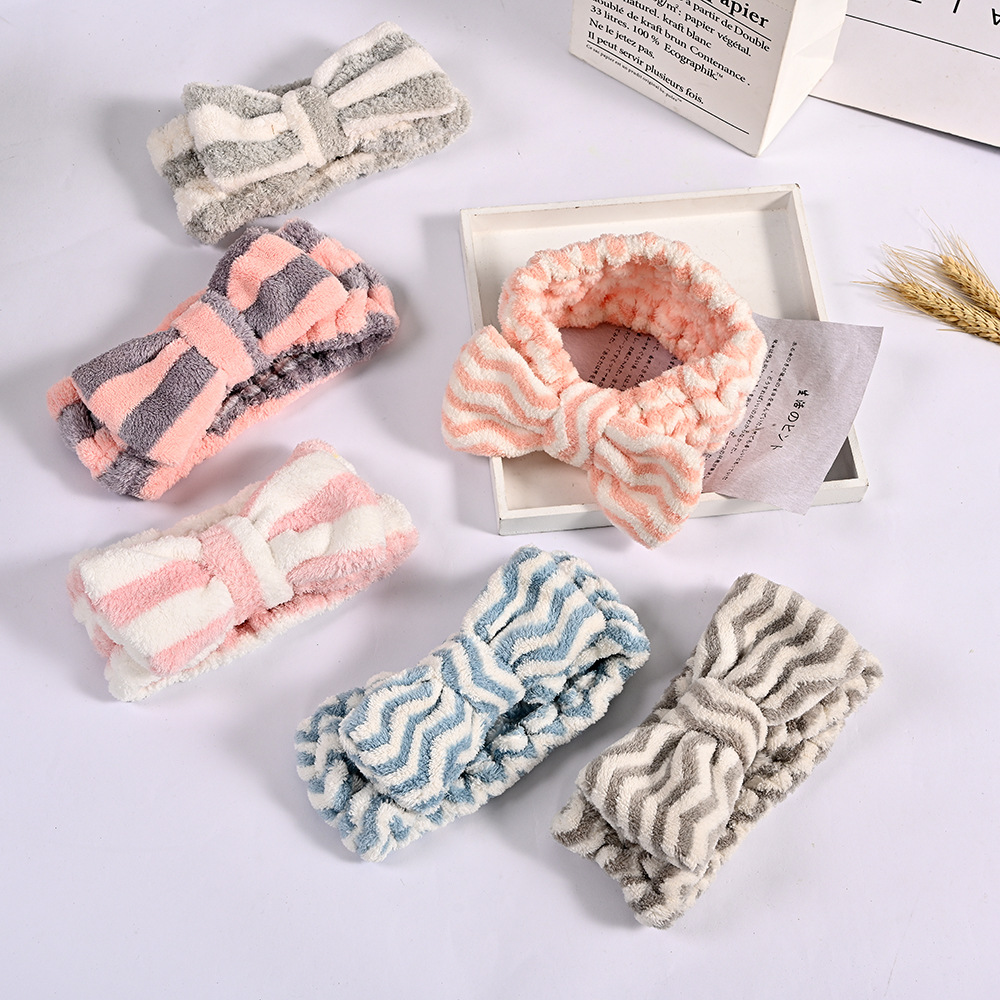 Factory daily necessities Korean coral fleece makeup cute plush girl makeup gift bow hair band accessories