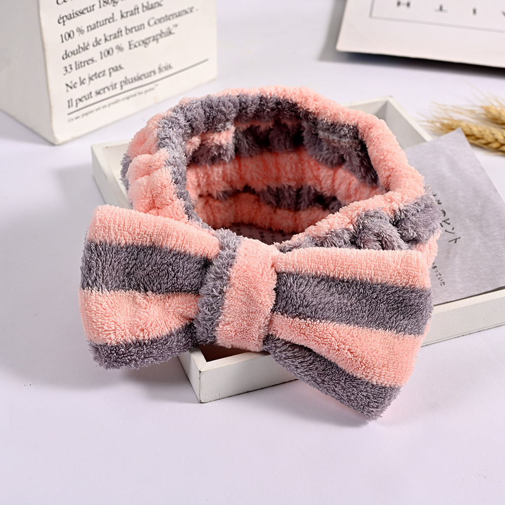Factory daily necessities Korean coral fleece makeup cute plush girl makeup gift bow hair band accessories