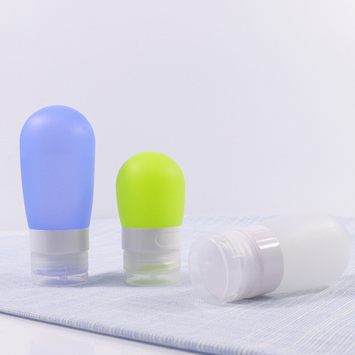 Manufacturer wholesale essential oil press bottle wash travel set cosmetic hose lotion bottle spherical silicone filling bottle