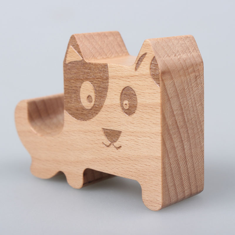 Soporte de teléfono móvil de madera maciza soporte de teléfono móvil de escritorio de dibujos animados cachorro base de teléfono móvil de madera libre logotipo tallado