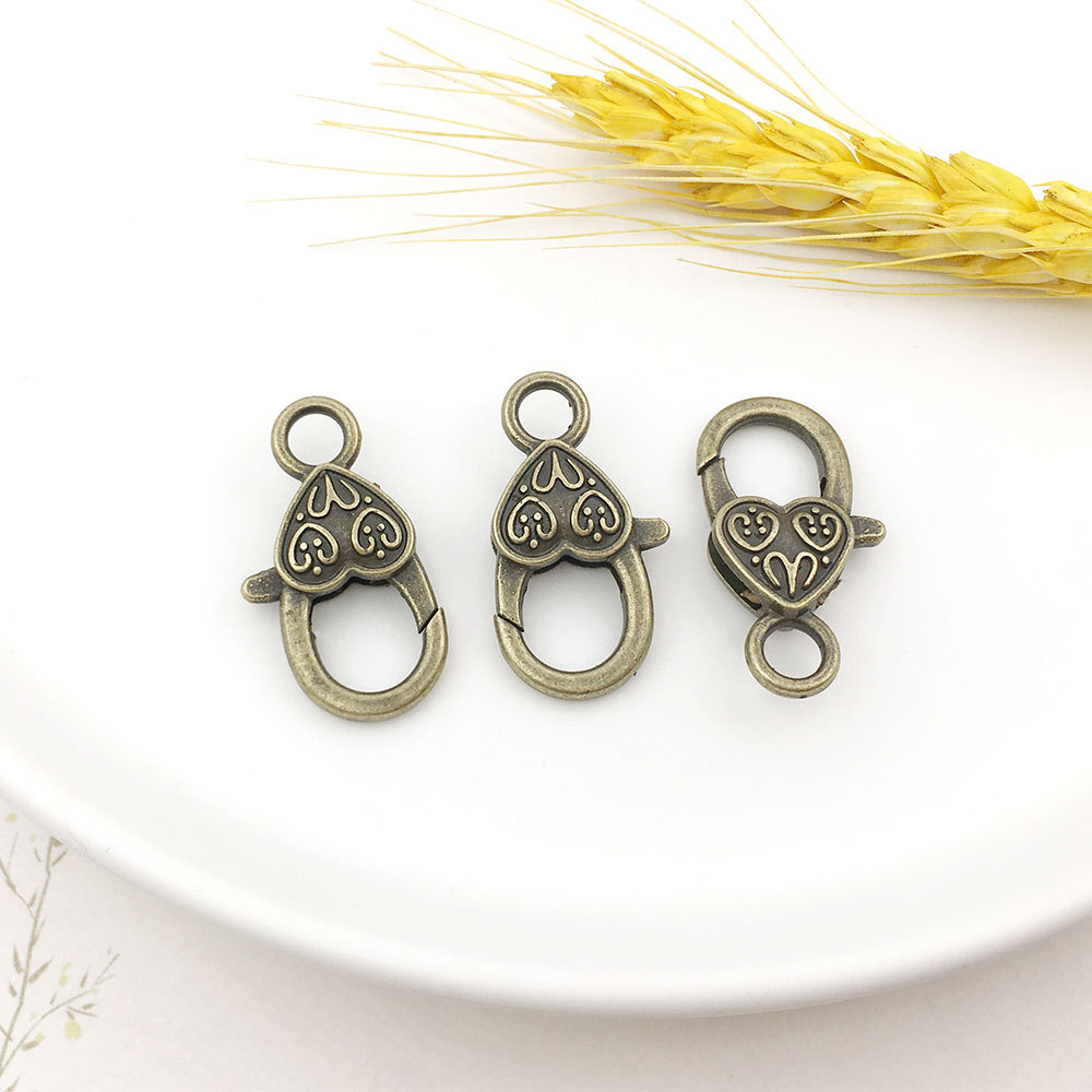 Melocotón hebilla de langosta en forma de corazón accesorios de llavero bricolaje hardware de equipaje hebilla de langosta en forma de corazón de aleación de zinc