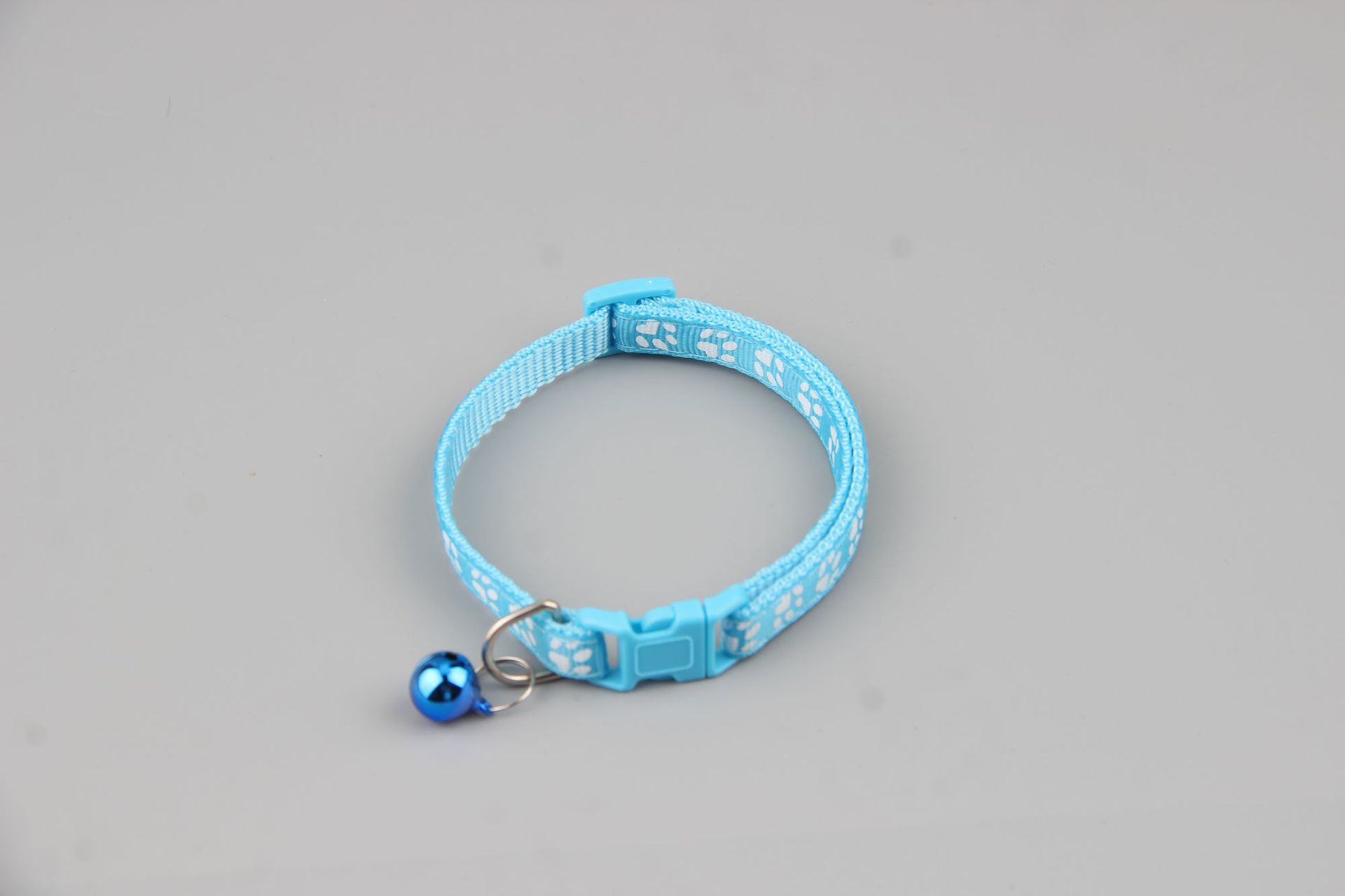 Collar de pegado de mascotas perros gatos una sola huella de pata impresa campana gatos brota gatito de nylon