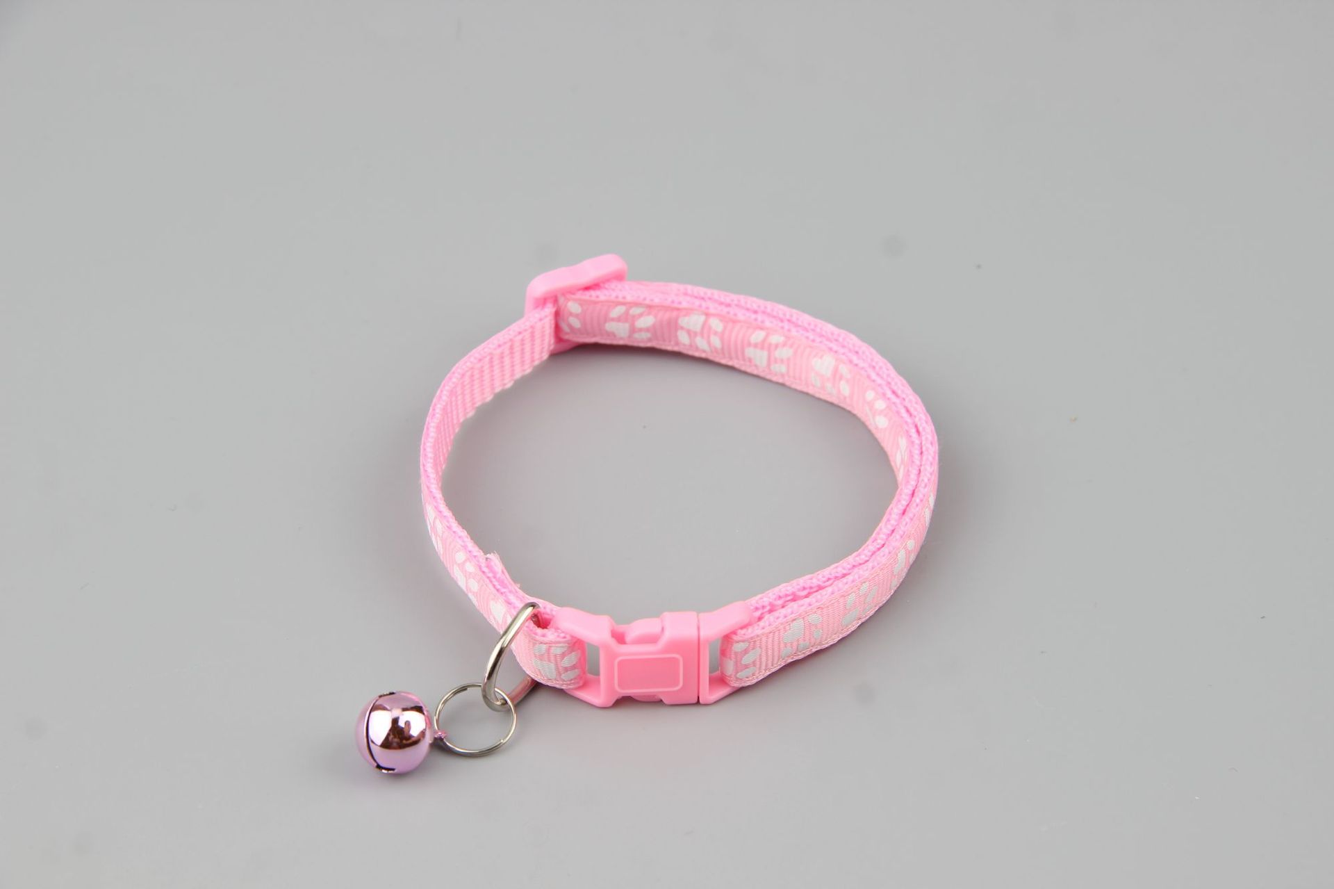Collar de pegado de mascotas perros gatos una sola huella de pata impresa campana gatos brota gatito de nylon