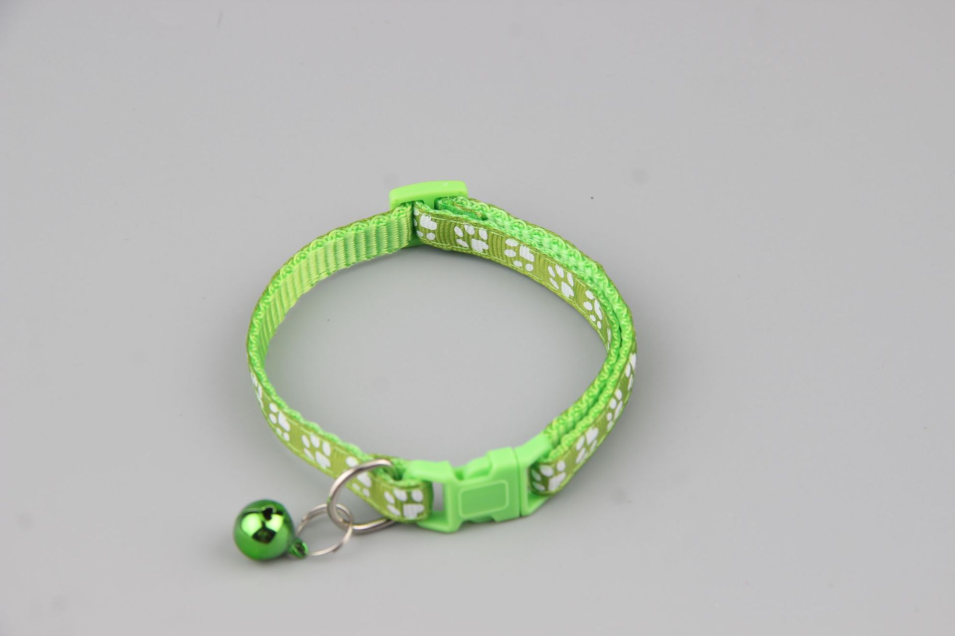 Collar de pegado de mascotas perros gatos una sola huella de pata impresa campana gatos brota gatito de nylon