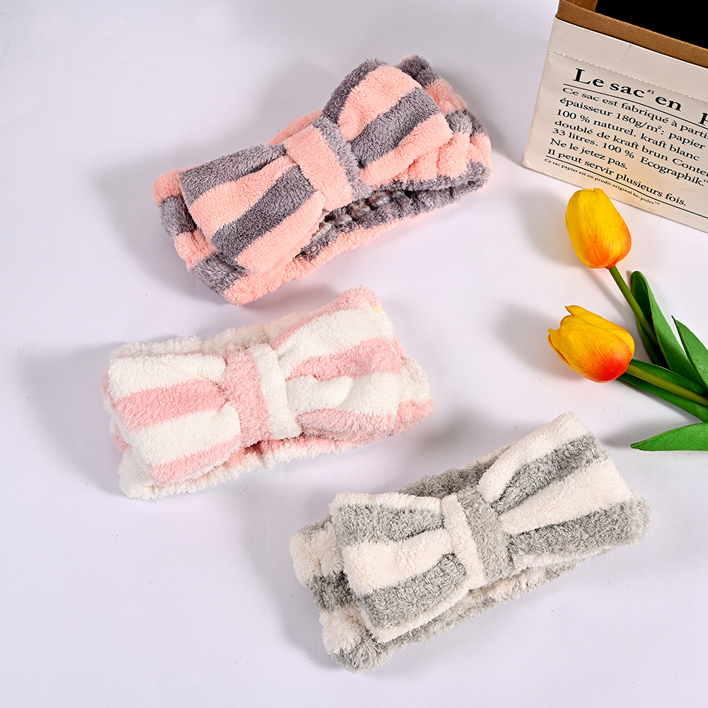 Factory daily necessities Korean coral fleece makeup cute plush girl makeup gift bow hair band accessories