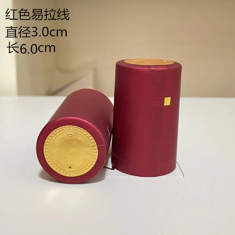 PVC tapa de plástico botella de vino rojo película de sellado cable de tracción fácil película Termocontraíble botella de vino de vidrio película de encogimiento en stock al por mayor