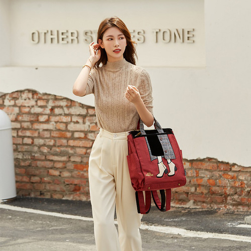 Cross-border direct supply MISZAPATOSS Japanese Rakuten high-end sense of minority backpack embroidery beauty leg waterproof women's double shoulder bag