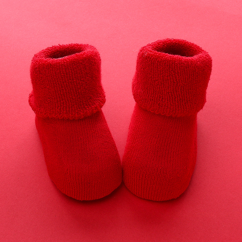 Hombres y mujeres recién nacidos, bebés, niños pequeños, una clase de algodón peinado, otoño e invierno, más calcetines rojos cálidos y gruesos de terciopelo