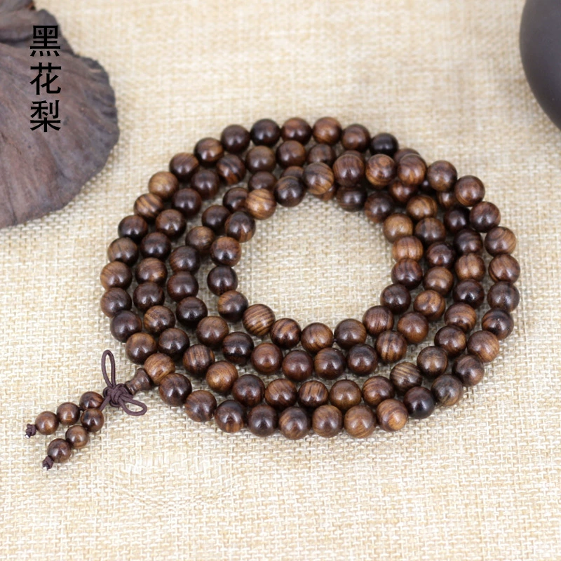 Пояс bracelet? Hmm need translate accurately: The first: "Black flower pear Buddha beads bracelet 0.6 0.8 with added spacer beads manufacturer supply Huanghuali bracelet" - This is messy. We should translate preserving meaning: