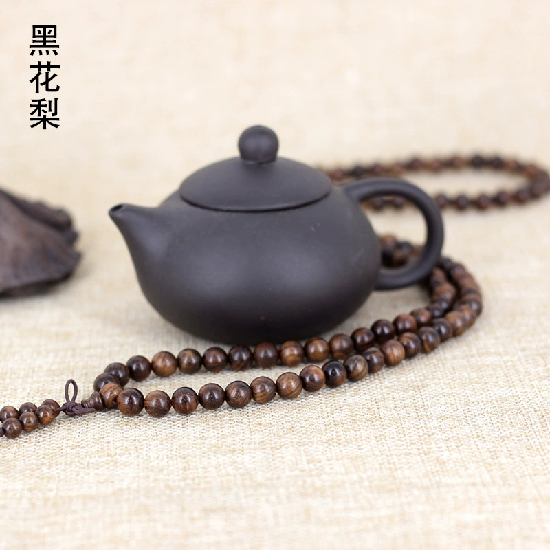 Пояс bracelet? Hmm need translate accurately: The first: "Black flower pear Buddha beads bracelet 0.6 0.8 with added spacer beads manufacturer supply Huanghuali bracelet" - This is messy. We should translate preserving meaning:
