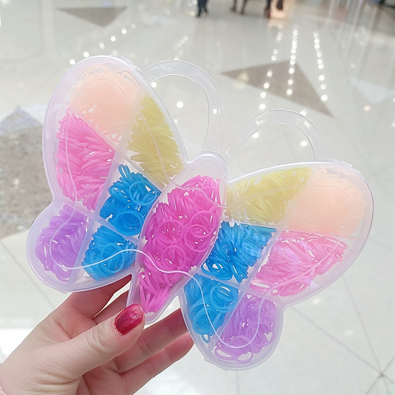 Nueva cuerda de pelo de las niñas de semillas de marca australiana mariposa en caja banda de pelo desechable banda de goma para niñas