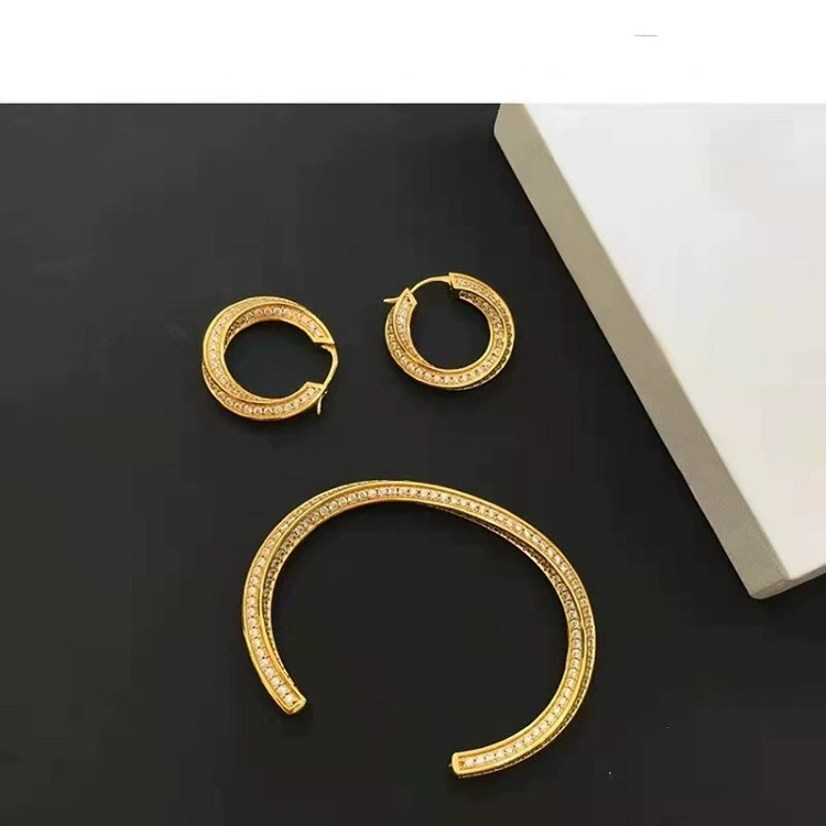 Golden brass earrings, bracelet, 2020