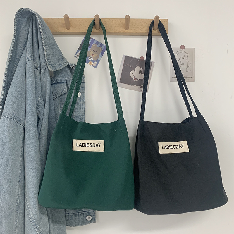 Nylon impermeable bolsa de lona de las mujeres de un solo hombro japonés Harajuku estudiante universitario ins Internet celebridad simple cien bolsa de tela de moda