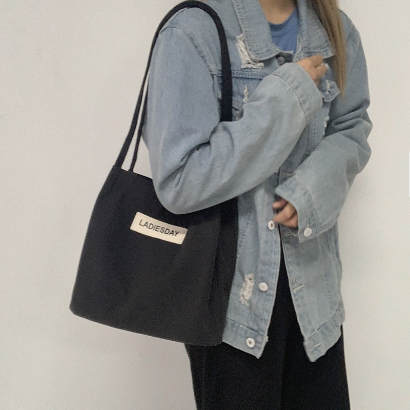 Nylon impermeable bolsa de lona de las mujeres de un solo hombro japonés Harajuku estudiante universitario ins Internet celebridad simple cien bolsa de tela de moda