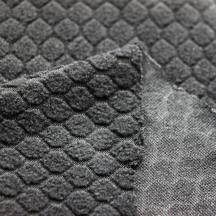 提花足球格摇粒绒夹克服装面料提花蜂巢六边形足球格单面摇粒绒布