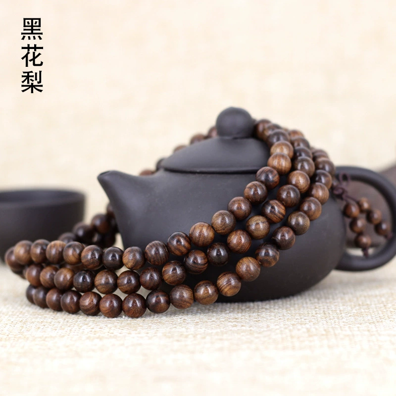Пояс bracelet? Hmm need translate accurately: The first: "Black flower pear Buddha beads bracelet 0.6 0.8 with added spacer beads manufacturer supply Huanghuali bracelet" - This is messy. We should translate preserving meaning: