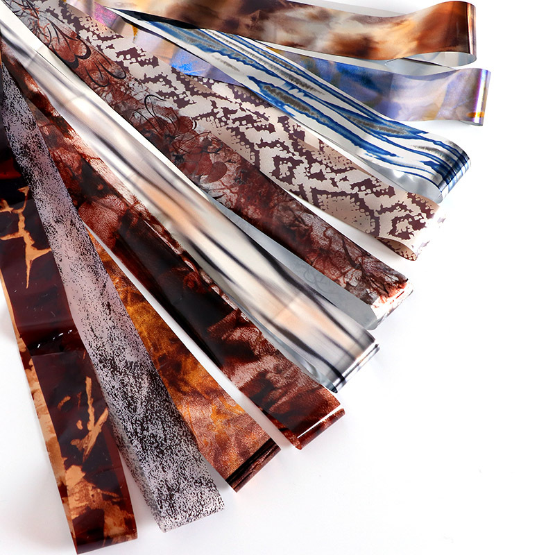 Arte de uñas flor cielo estrellado traje de papel Aurora láser cielo estrellado papel 10 colores encaje en caja etiqueta engomada de la transferencia