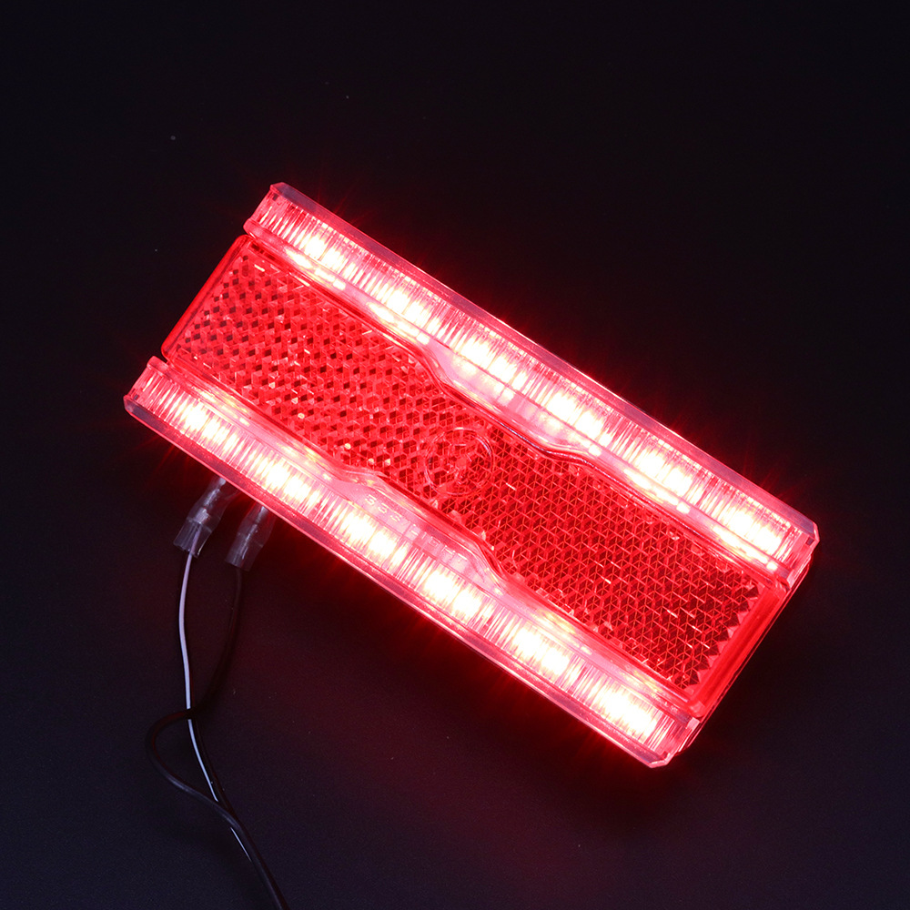 Amplio voltaje de La Bicicleta vehículo Eléctrico la motocicleta luz trasera bajo nivel flash freno táctil batería LED que fluye agua dirección