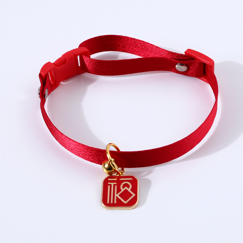 Productos para mascotas de Año Nuevo campana de viento china botón de seguridad felino accesorios collar Fuchun colgante de dragón