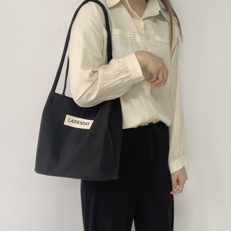 Nylon impermeable bolsa de lona de las mujeres de un solo hombro japonés Harajuku estudiante universitario ins Internet celebridad simple cien bolsa de tela de moda