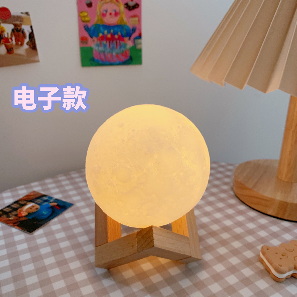 Creative ins nueva lámpara de mesa dormitorio mesita de noche en línea celebridad luz nocturna Lámpara pequeña para niña Luna cielo estrellado proyección sueño