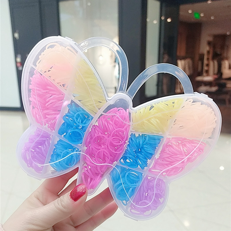 Nueva cuerda de pelo de las niñas de semillas de marca australiana mariposa en caja banda de pelo desechable banda de goma para niñas